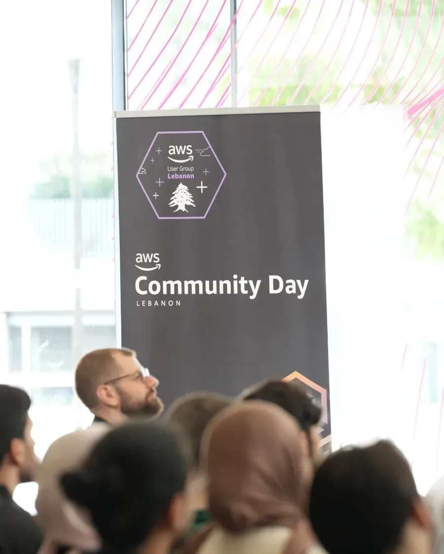 Audience in front of the AWS Community Day Lebanon banner